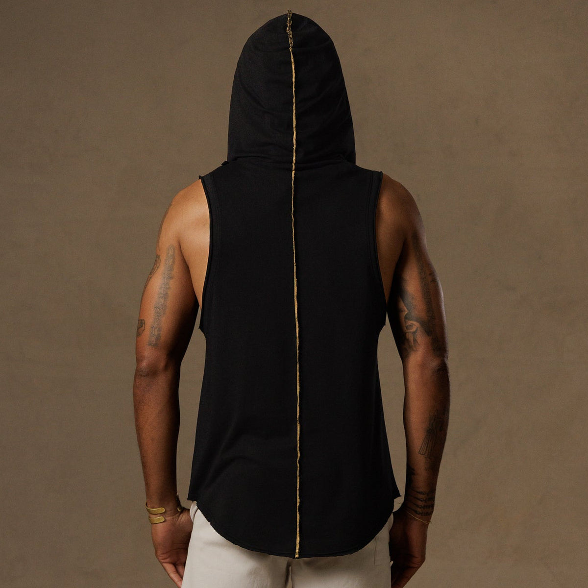 male modeling black hooded tree tank