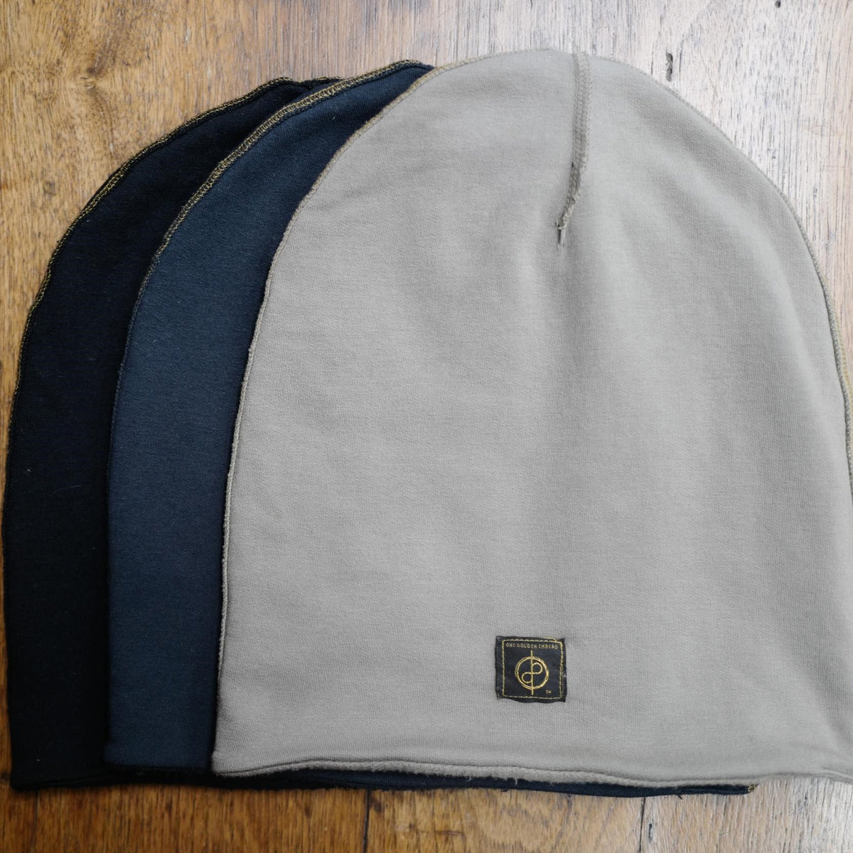 The OG Cloud Beanies in Black, Charcoal Blue, and Shroom
