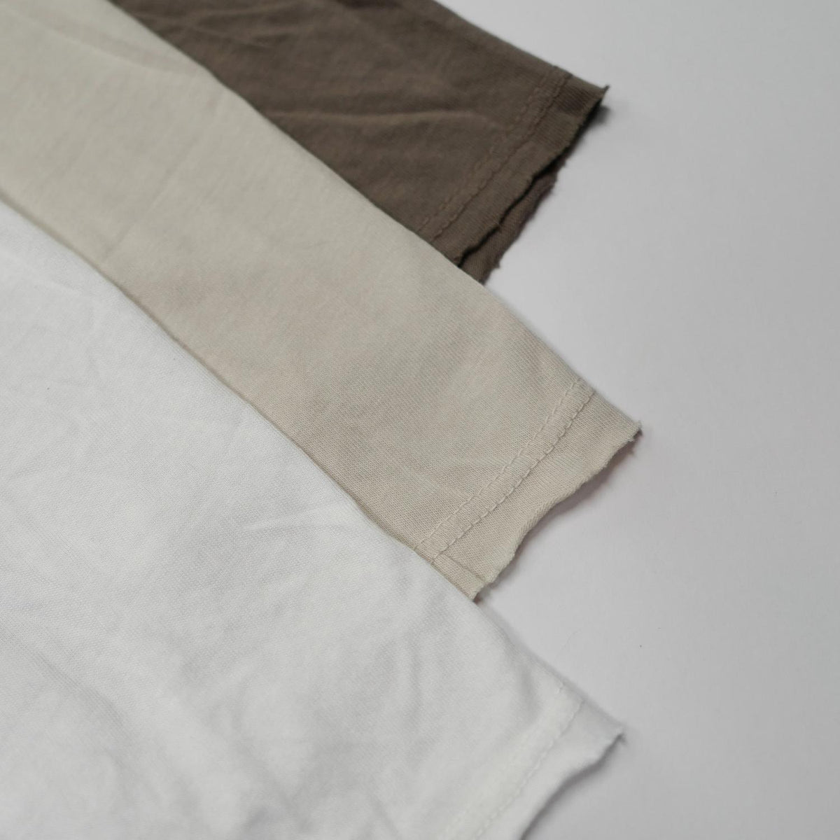 Flat lay of v neck three pack in different colors