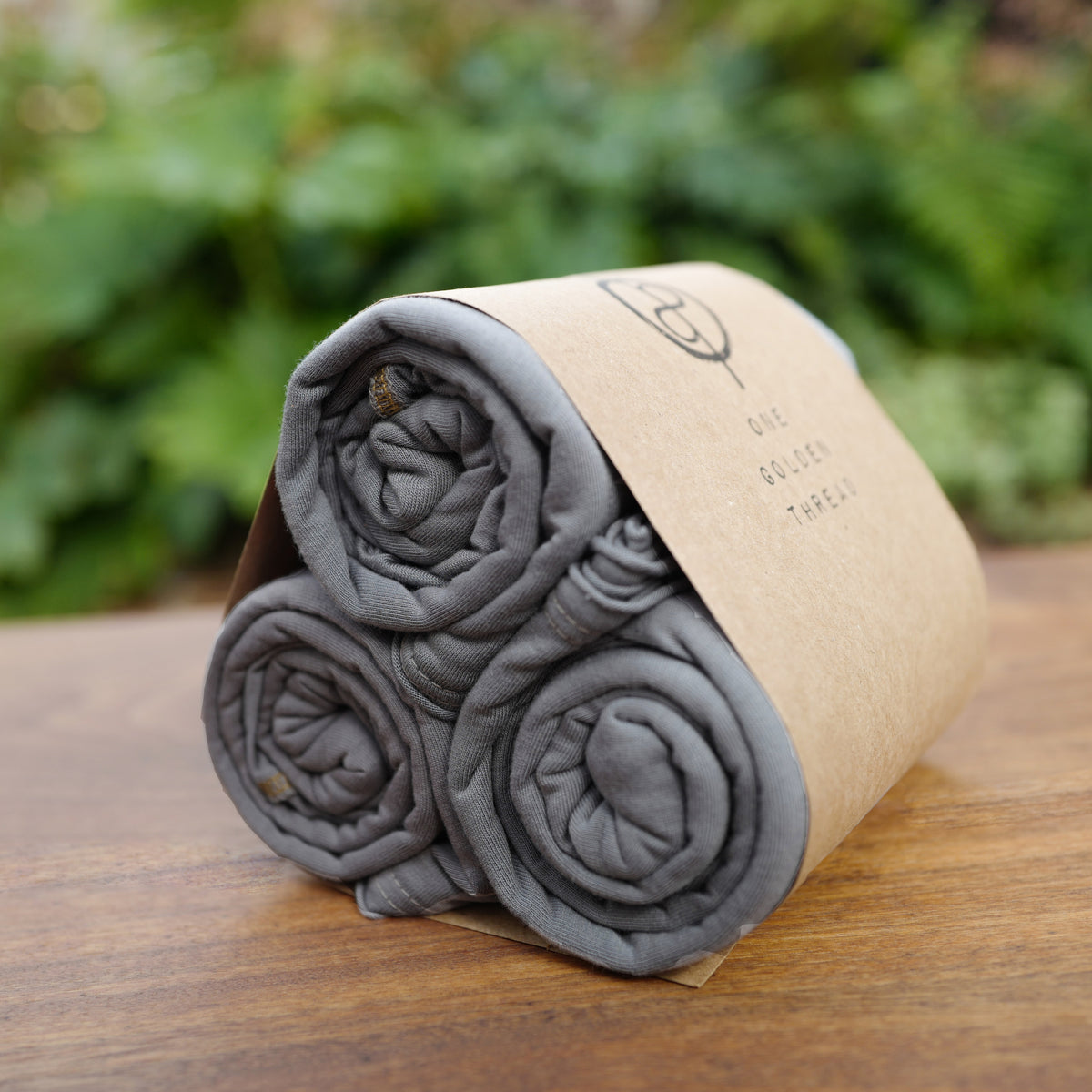 Bundle packaging of ultimate tee three pack in deep clay
