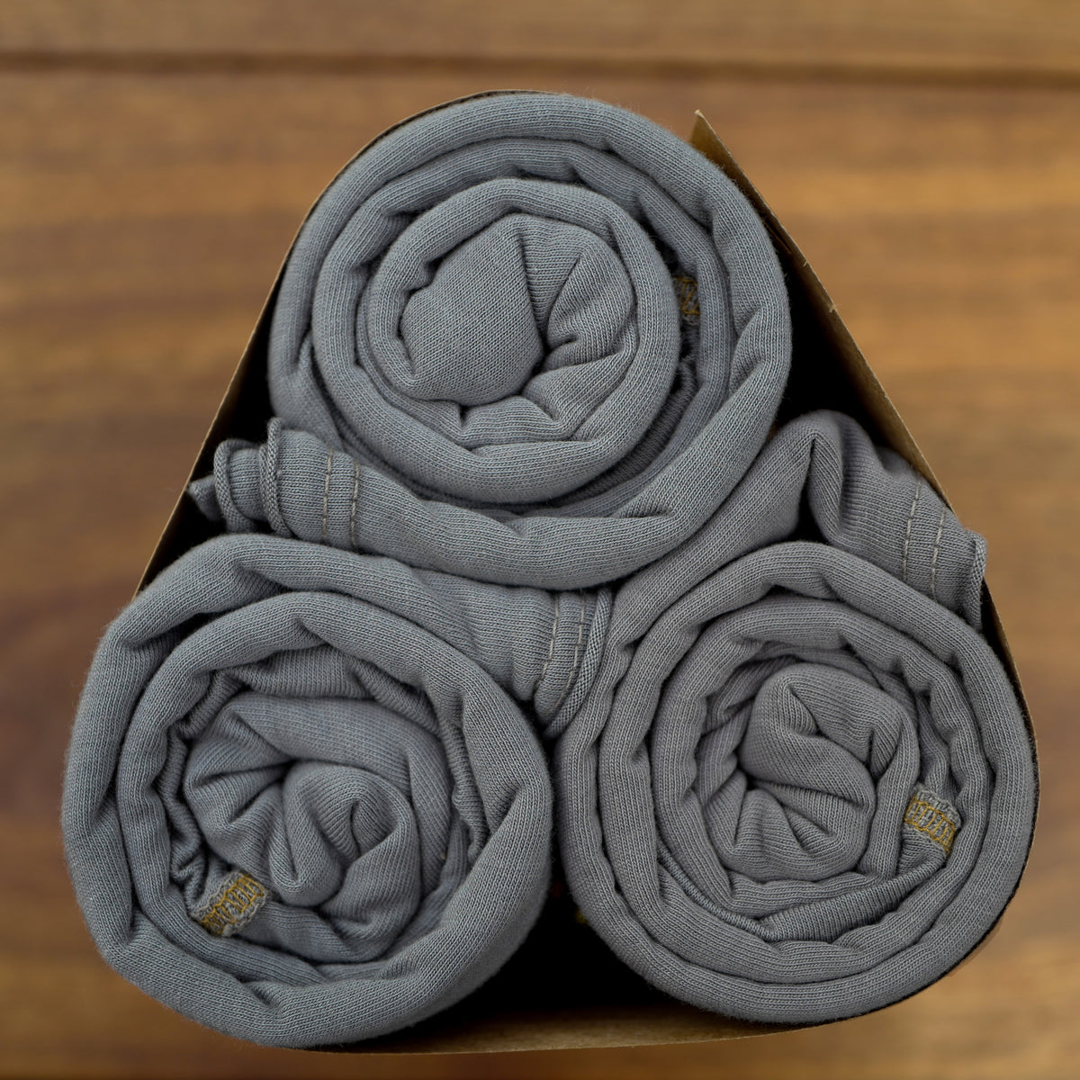 Bundle packaging of ultimate tee three pack in deep clay