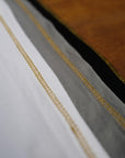 Flat lay of ultimate tee three pack in different colors