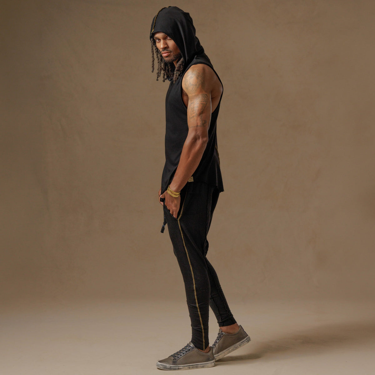 male modeling black hooded tree tank