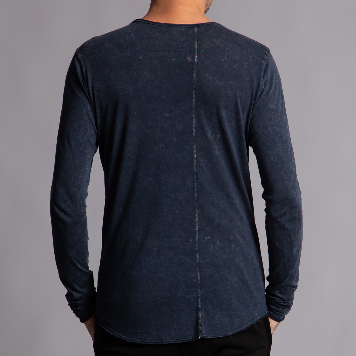 Man modeling a long sleeve crew shirt in charcoal blue