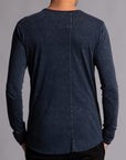 Man modeling a long sleeve crew shirt in charcoal blue