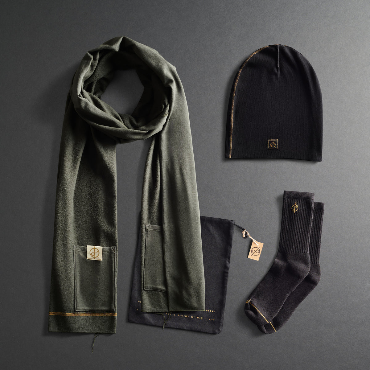 Green scarf, black beanie, and socks gift set