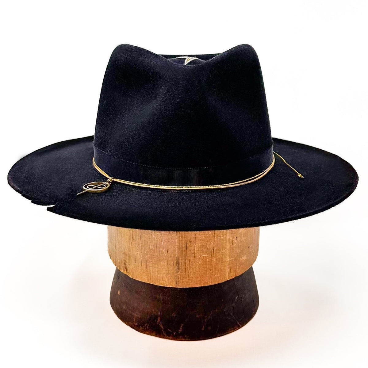 Closeup of OGT Bespoke Hat with 108 Talisman