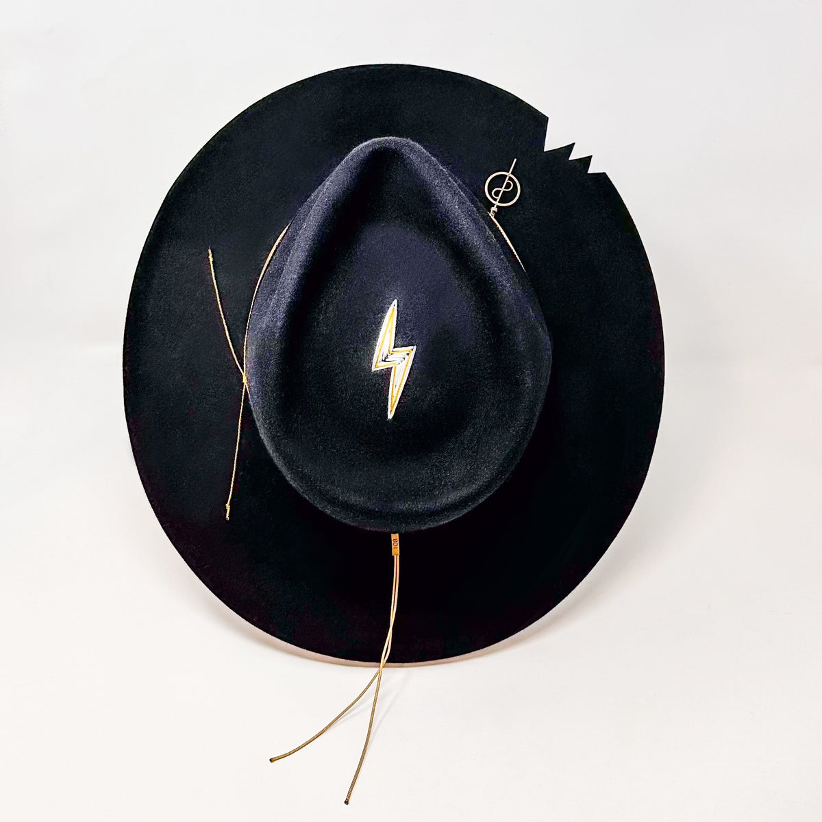 Closeup of OGT Bespoke Hat with 108 Talisman