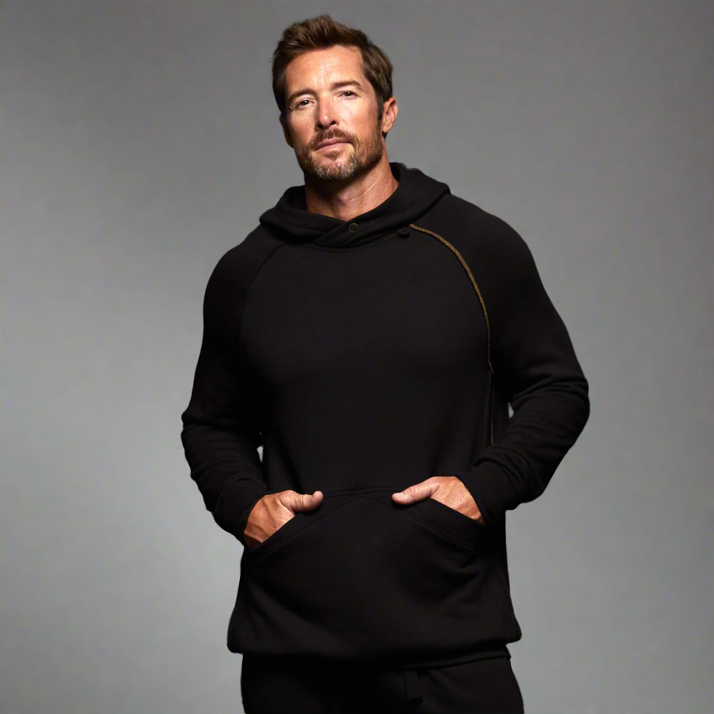 man modeling pullover plush hoodie in black