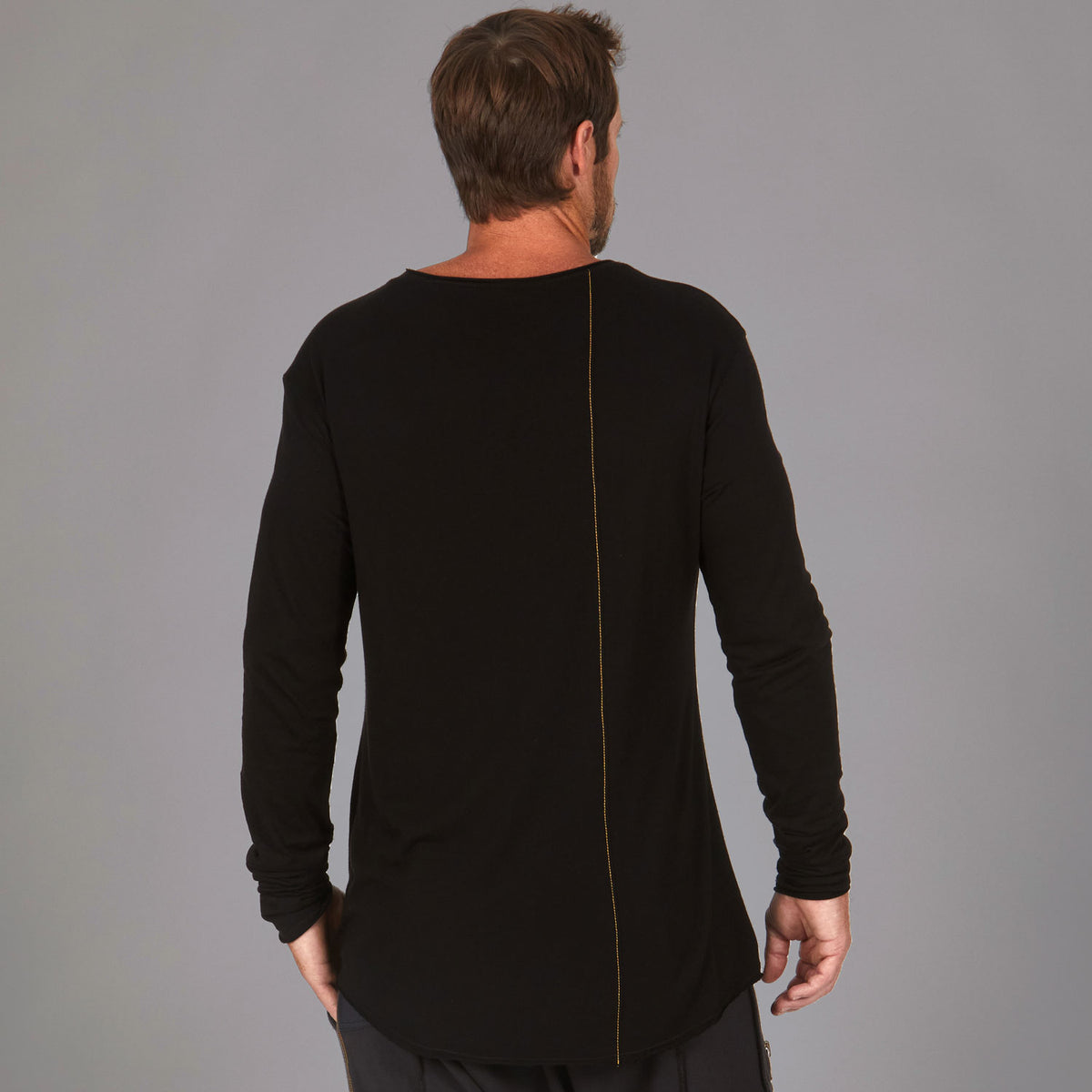 Man modeling a long sleeve crew shirt in black