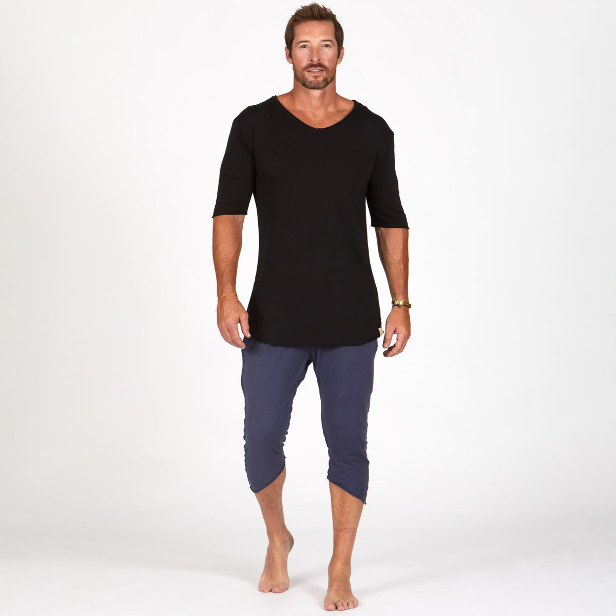 Male modeling Charcoal Blue yogo mid shorts