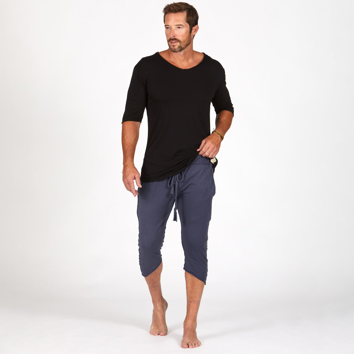 Male modeling Charcoal Blue yogo mid shorts