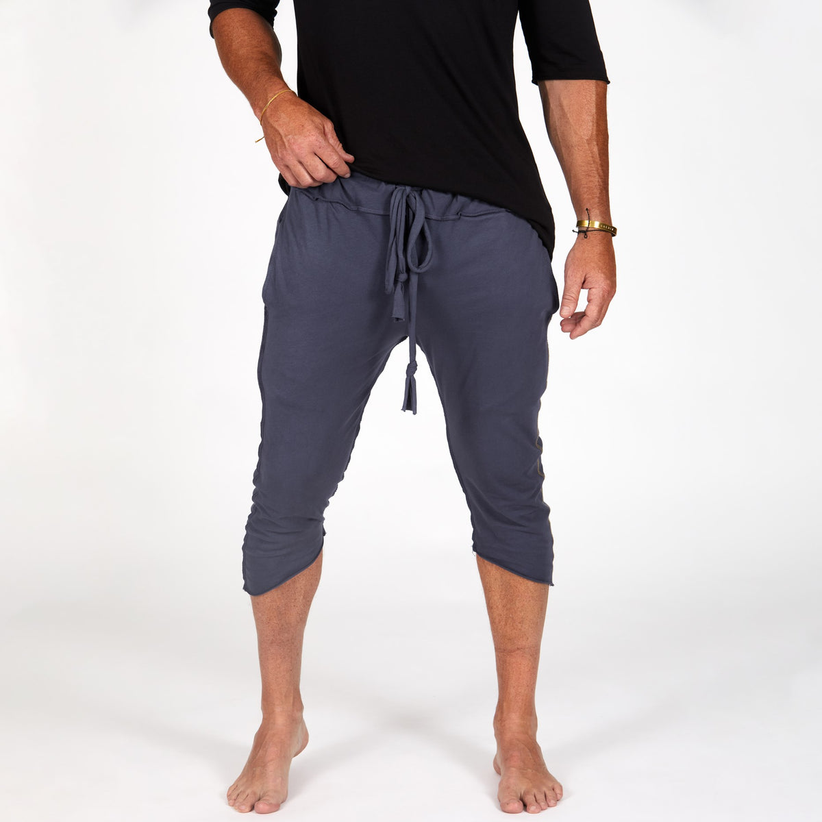Male modeling Charcoal Blue yogo mid shorts