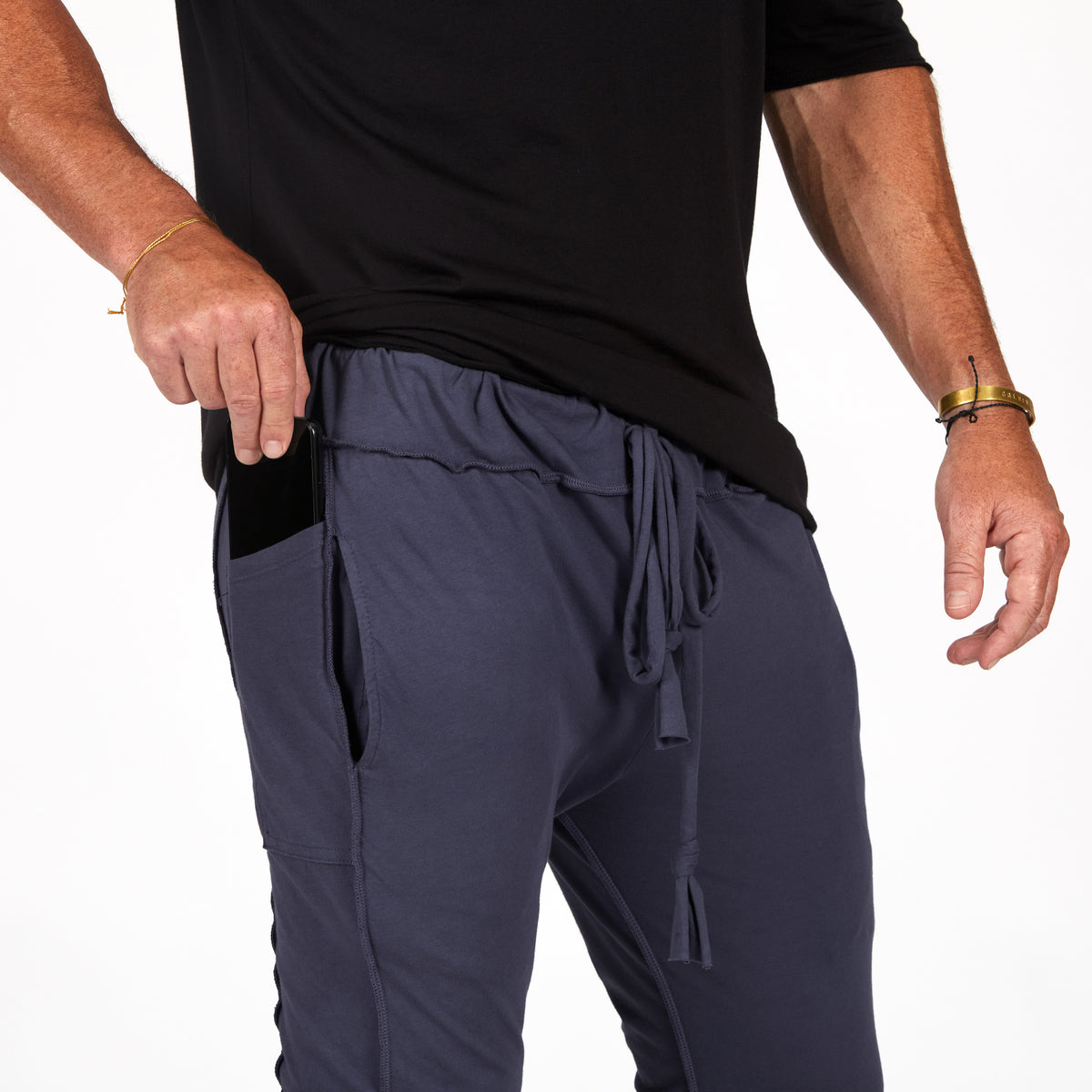 Male modeling Charcoal Blue yogo mid shorts