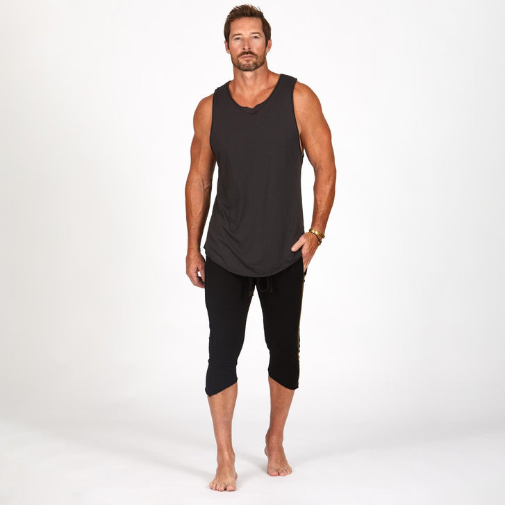 Male modeling black yogo mid shorts