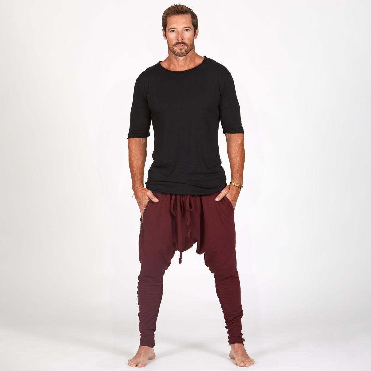 Male modeling Bordeaux colored pants