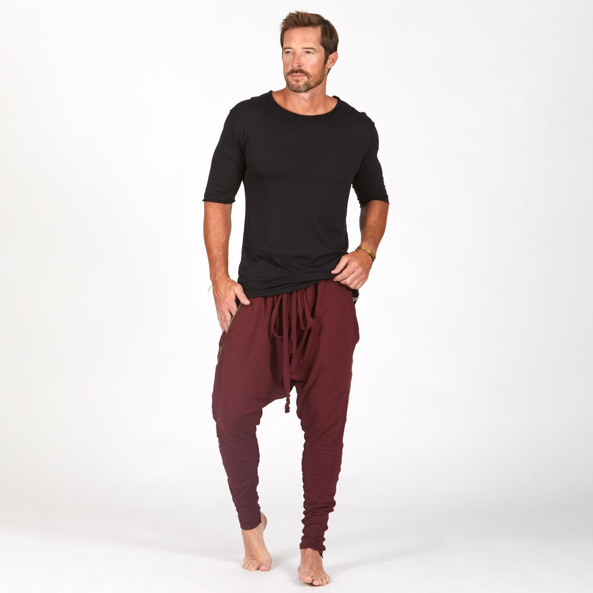 Male modeling Bordeaux colored pants