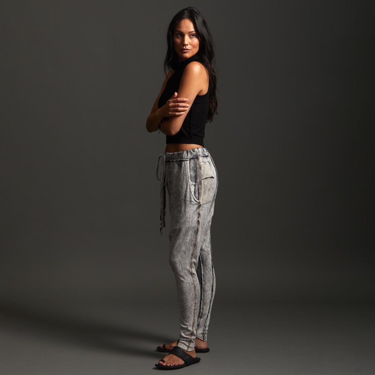 Woman modeling dance pants in Grey Mineral Wash