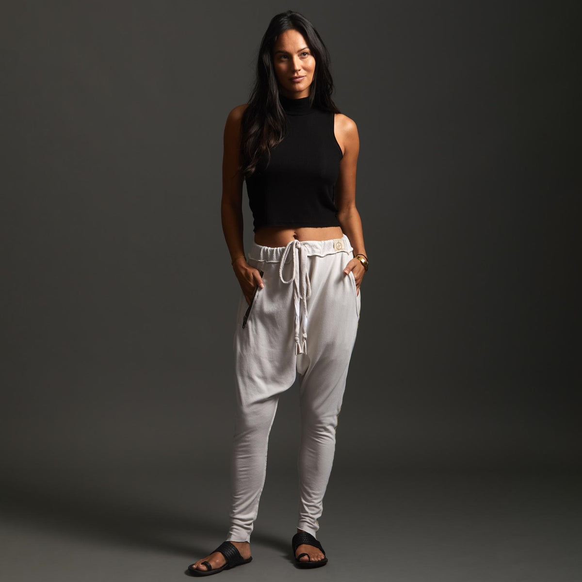 Woman modeling dance pants in White Stone