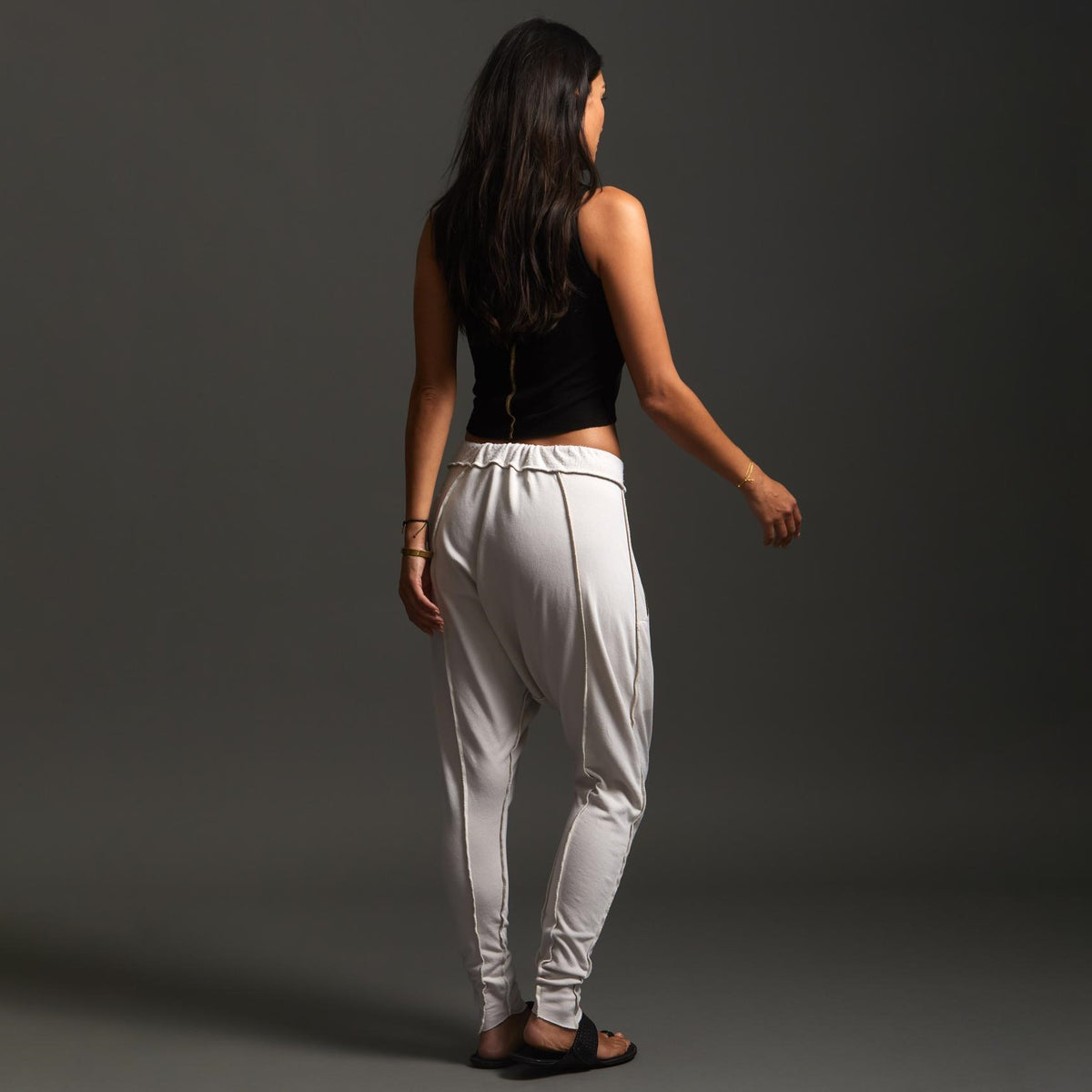 Woman modeling dance pants in White Stone