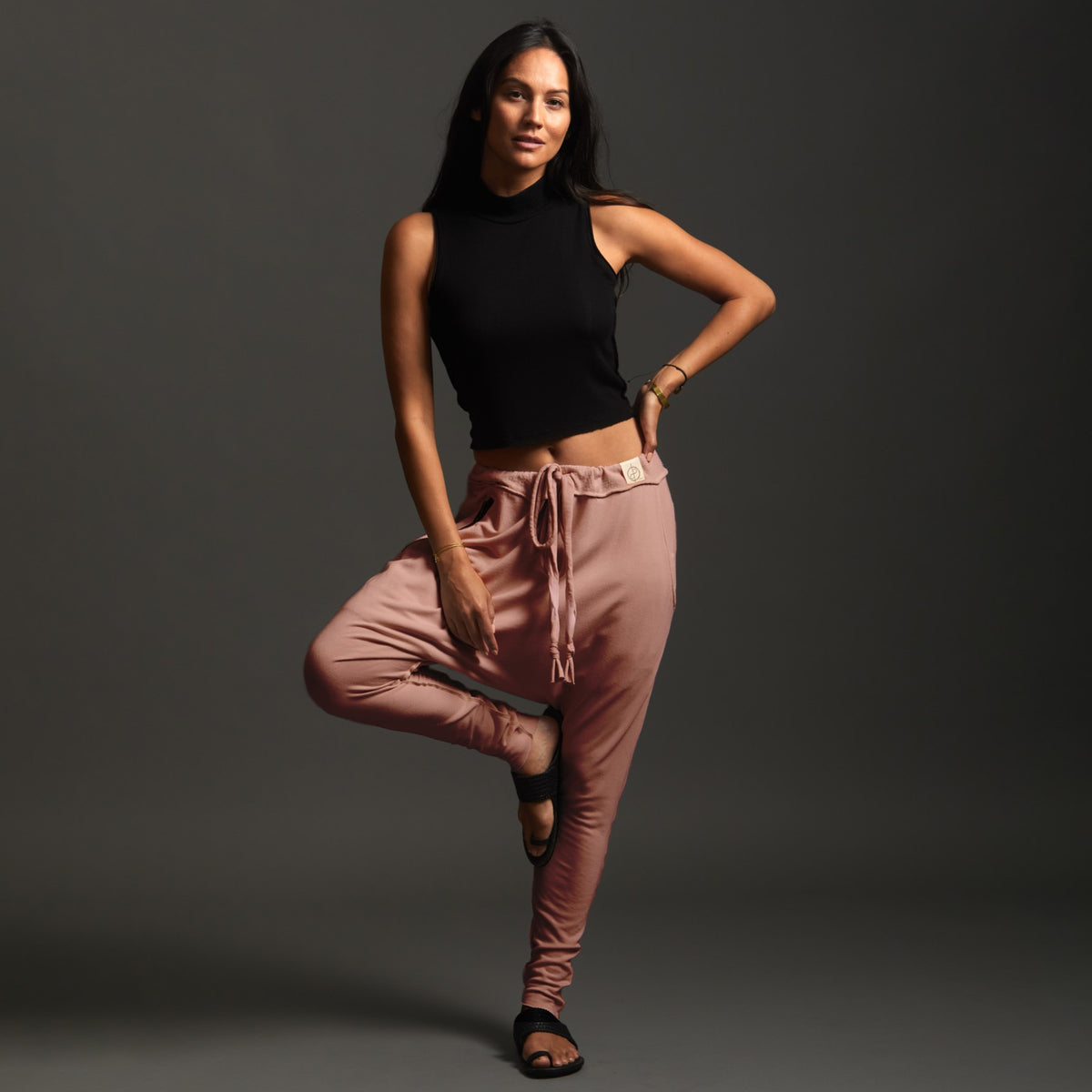 Woman modeling dance pants in Himalayan Salt