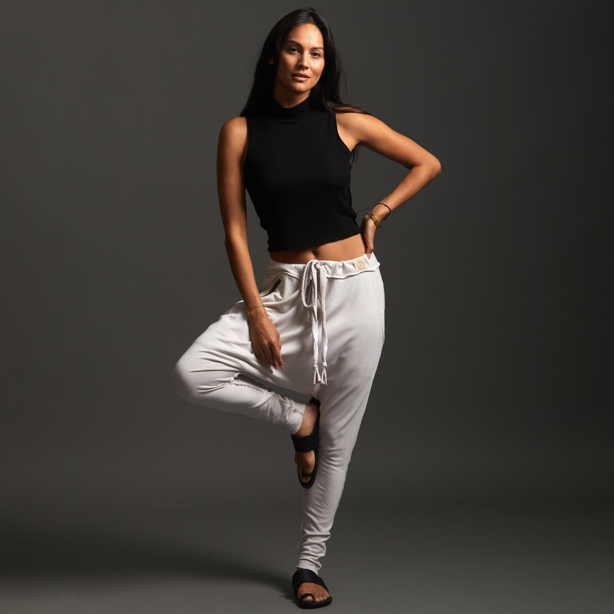 Woman modeling dance pants in White Stone