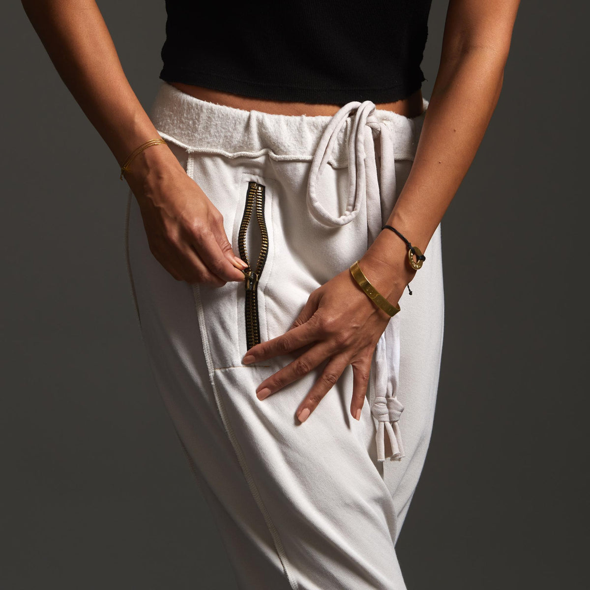 Woman modeling dance pants in White Stone