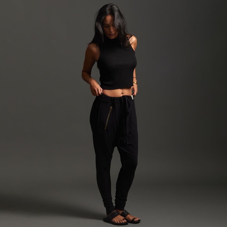 Woman modeling dance pants in Black