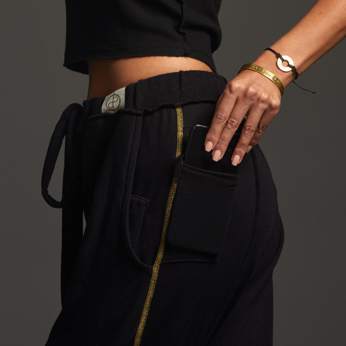 Woman modeling dance pants in Black