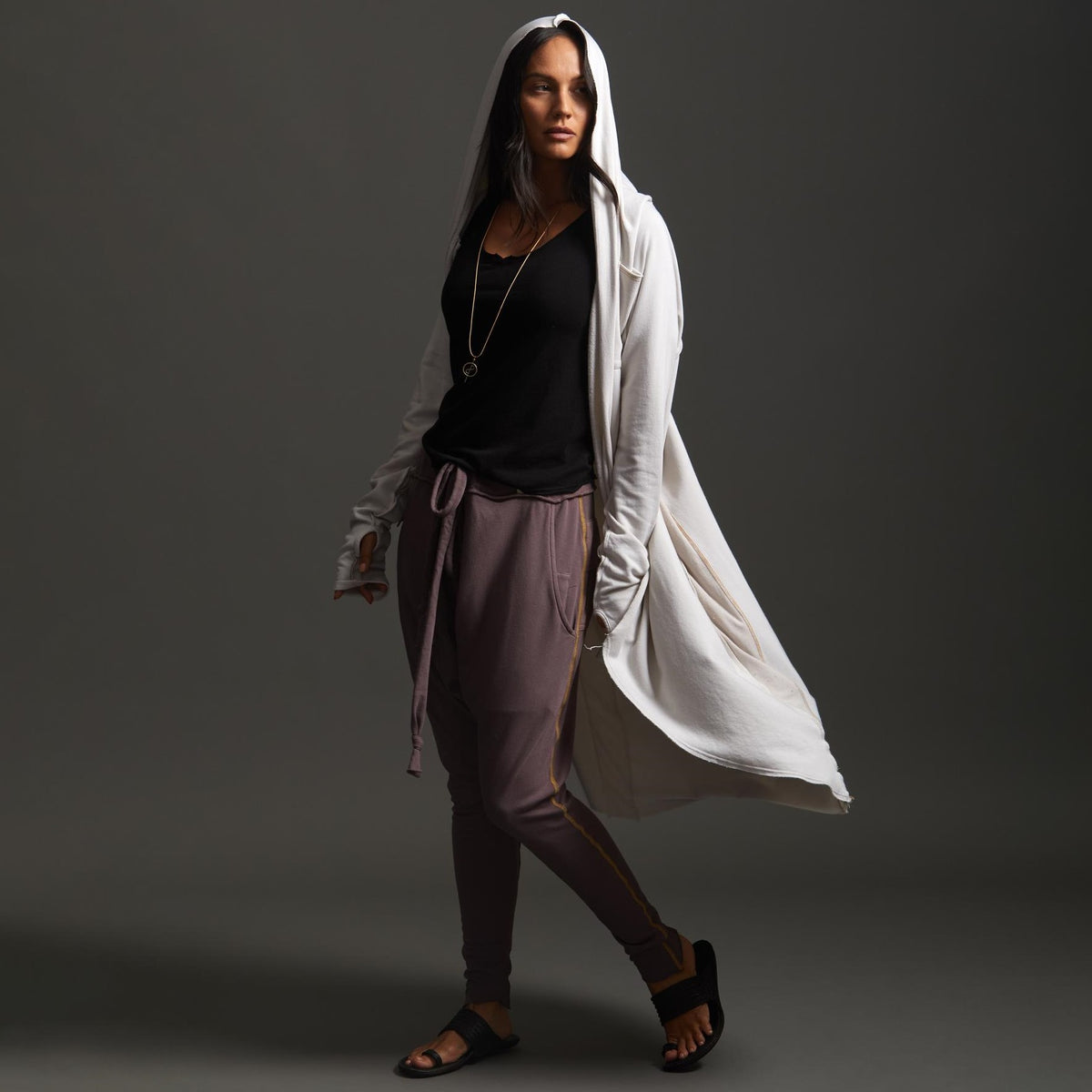 Woman modeling white aion duster