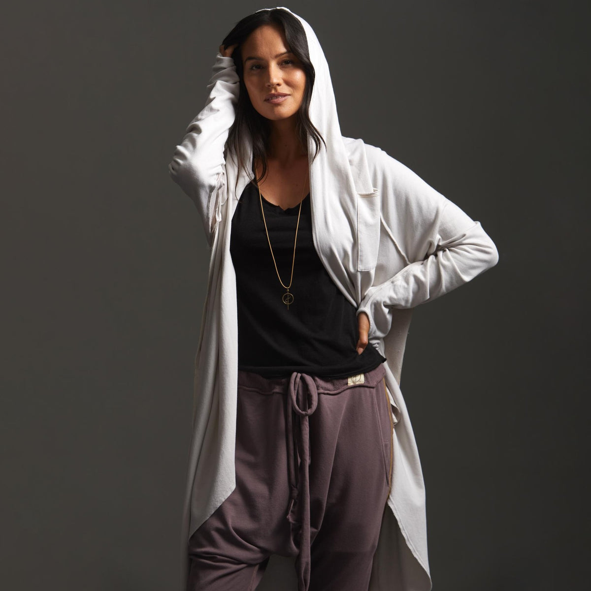 Woman modeling white aion duster