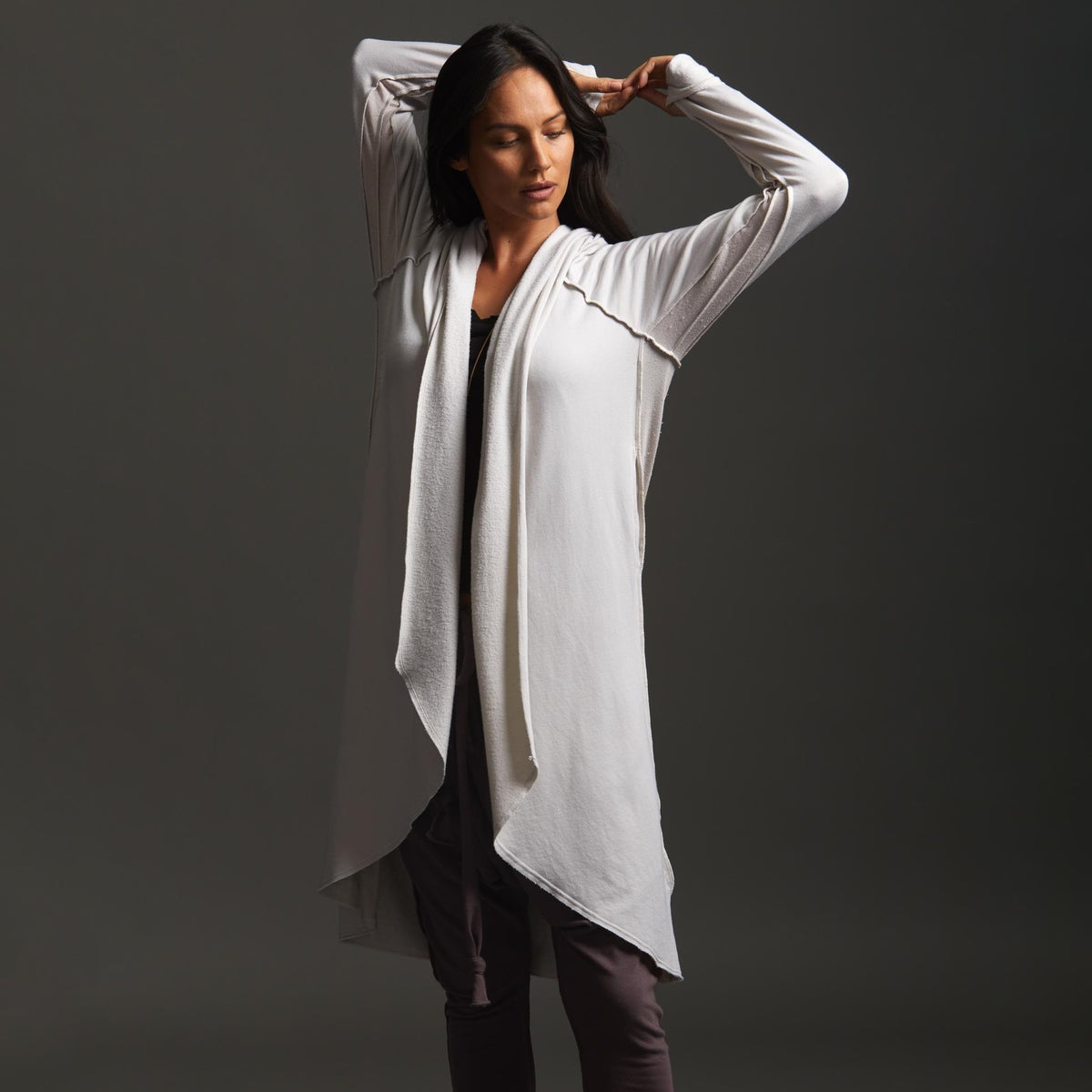 Woman modeling white aion duster