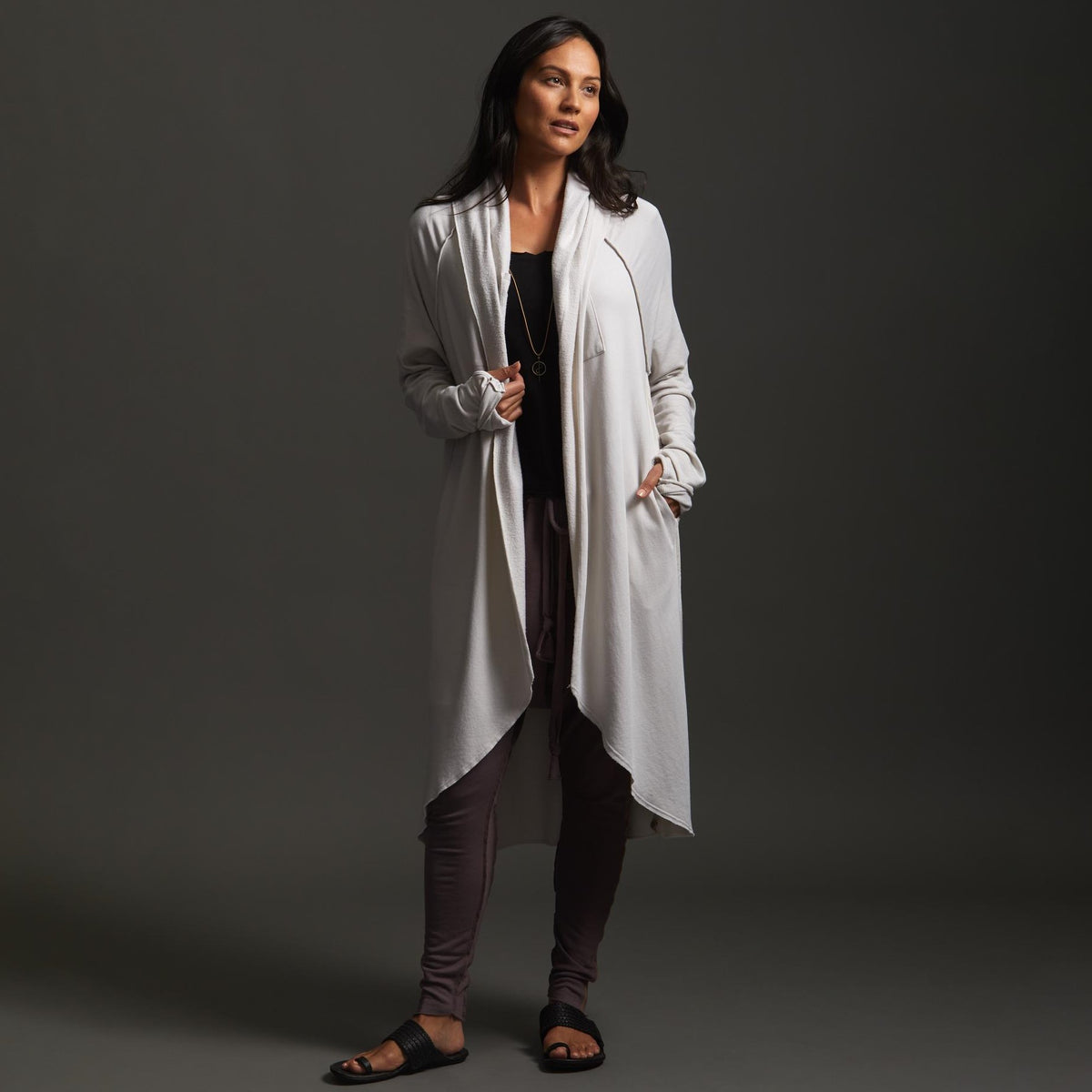 Woman modeling white aion duster