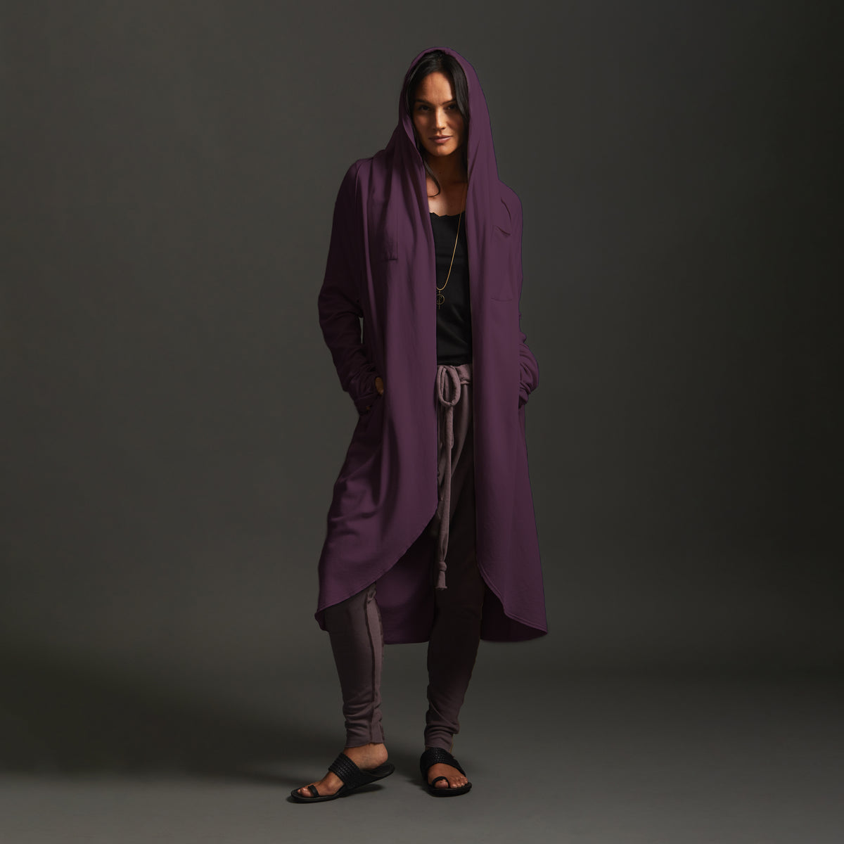 Female modeling purple aion duster