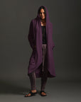 Female modeling purple aion duster