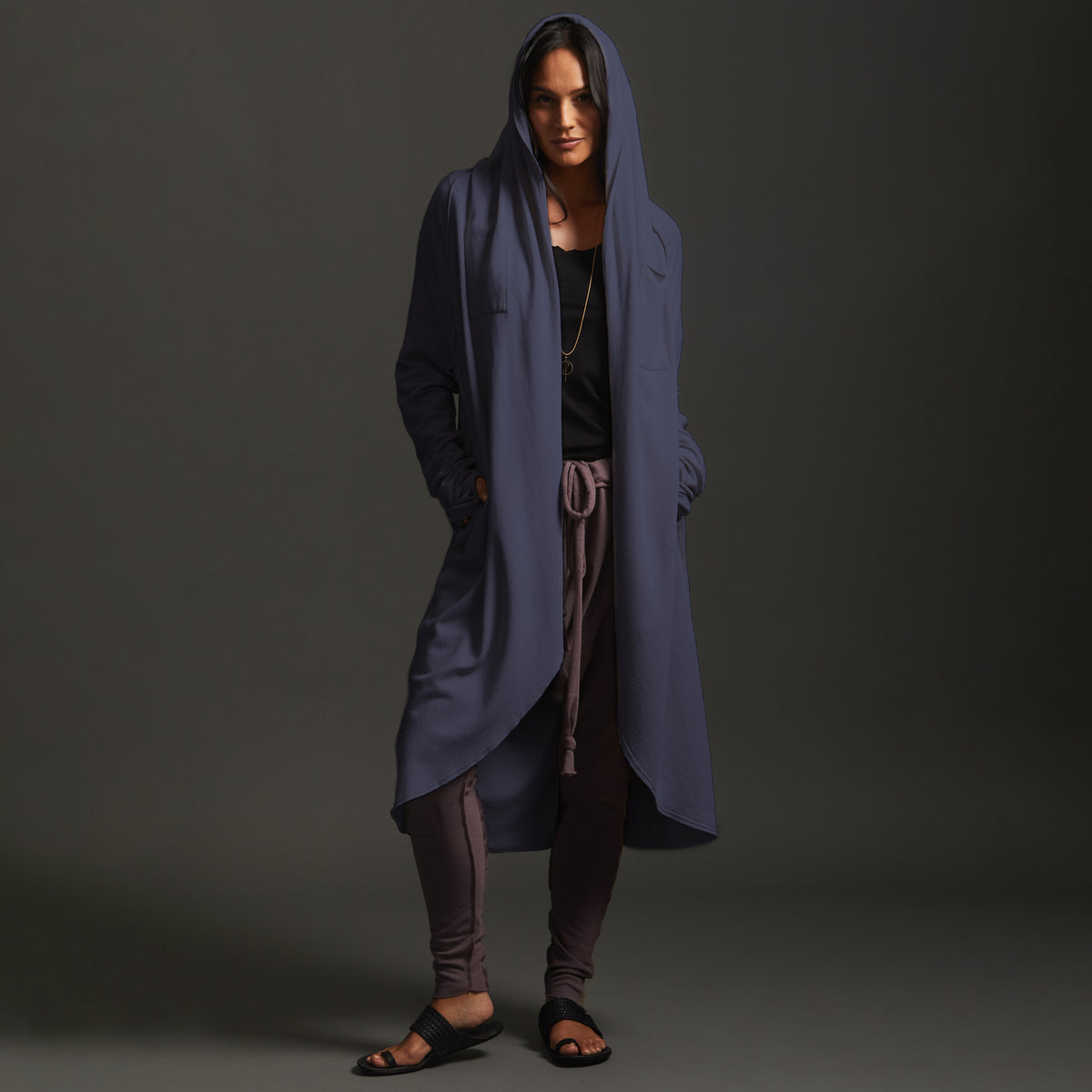 Woman modeling dark blue aion duster