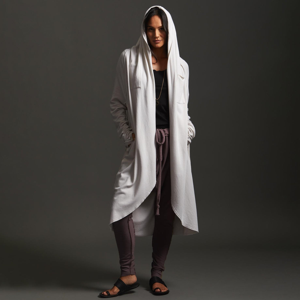 Woman modeling white aion duster
