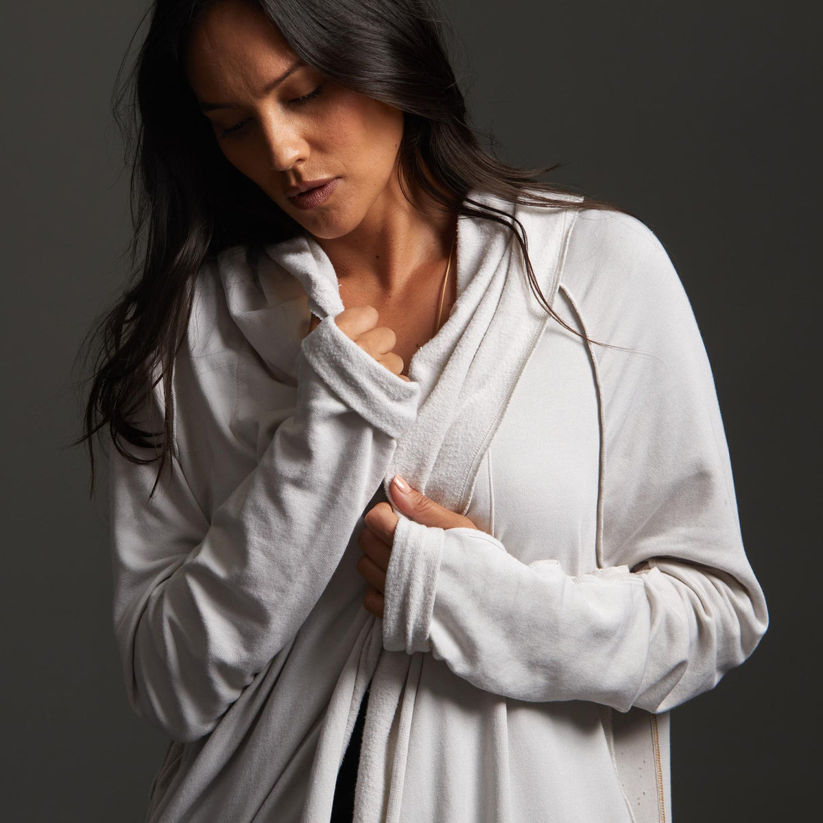 Woman modeling white aion duster
