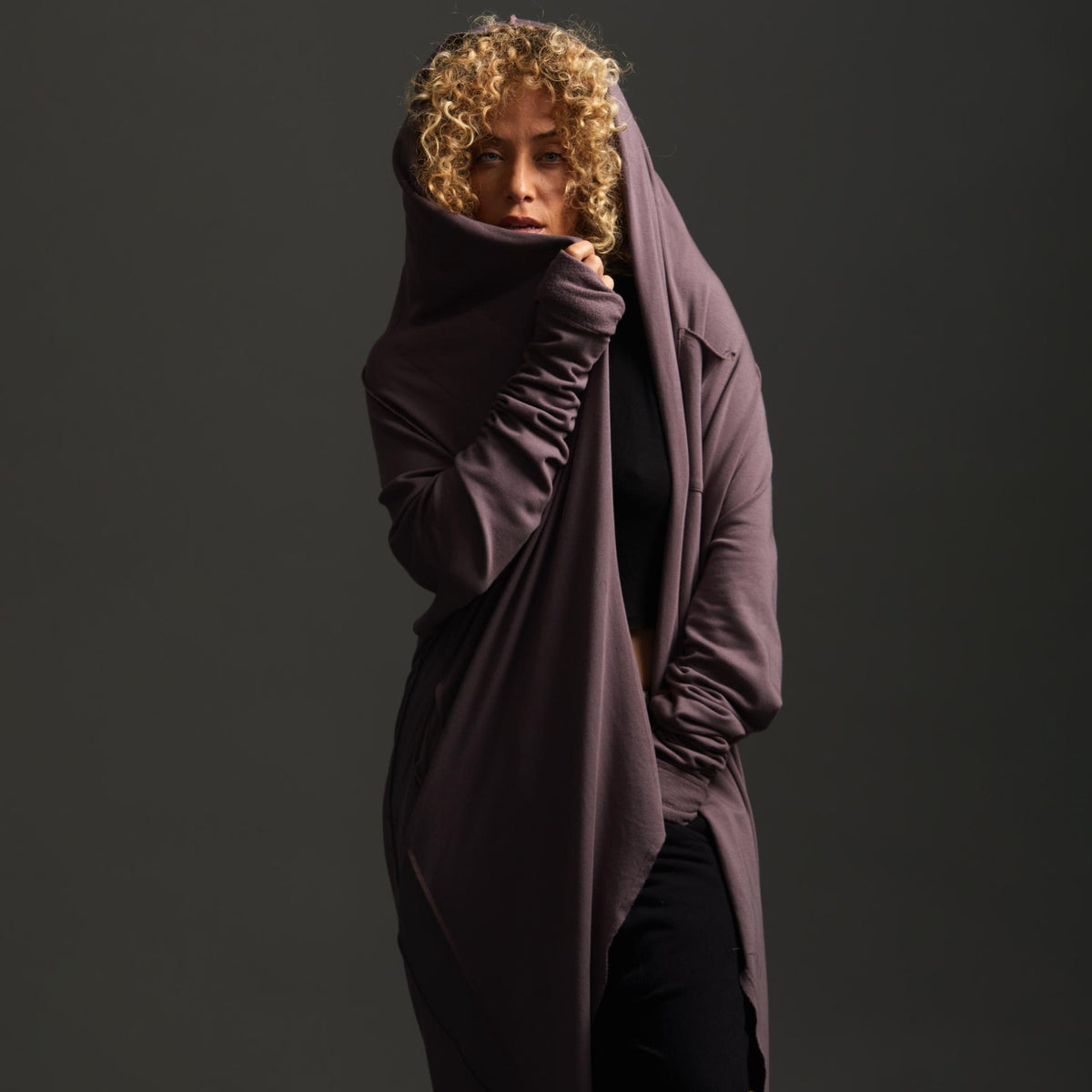 Woman modeling lavender aion duster