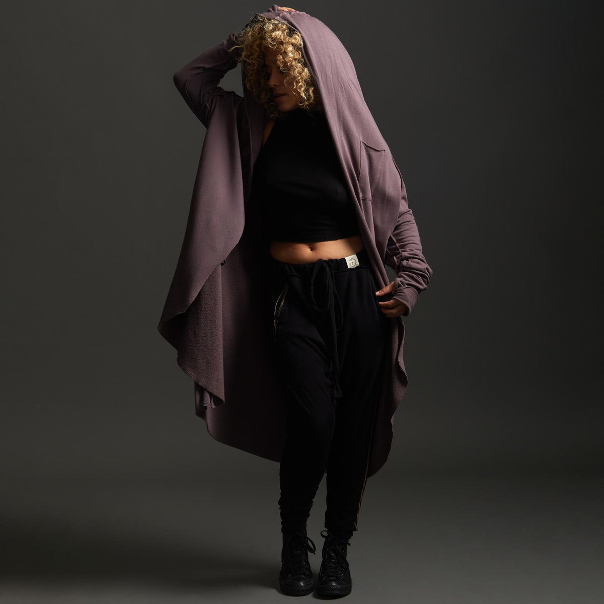 Woman modeling lavender aion duster