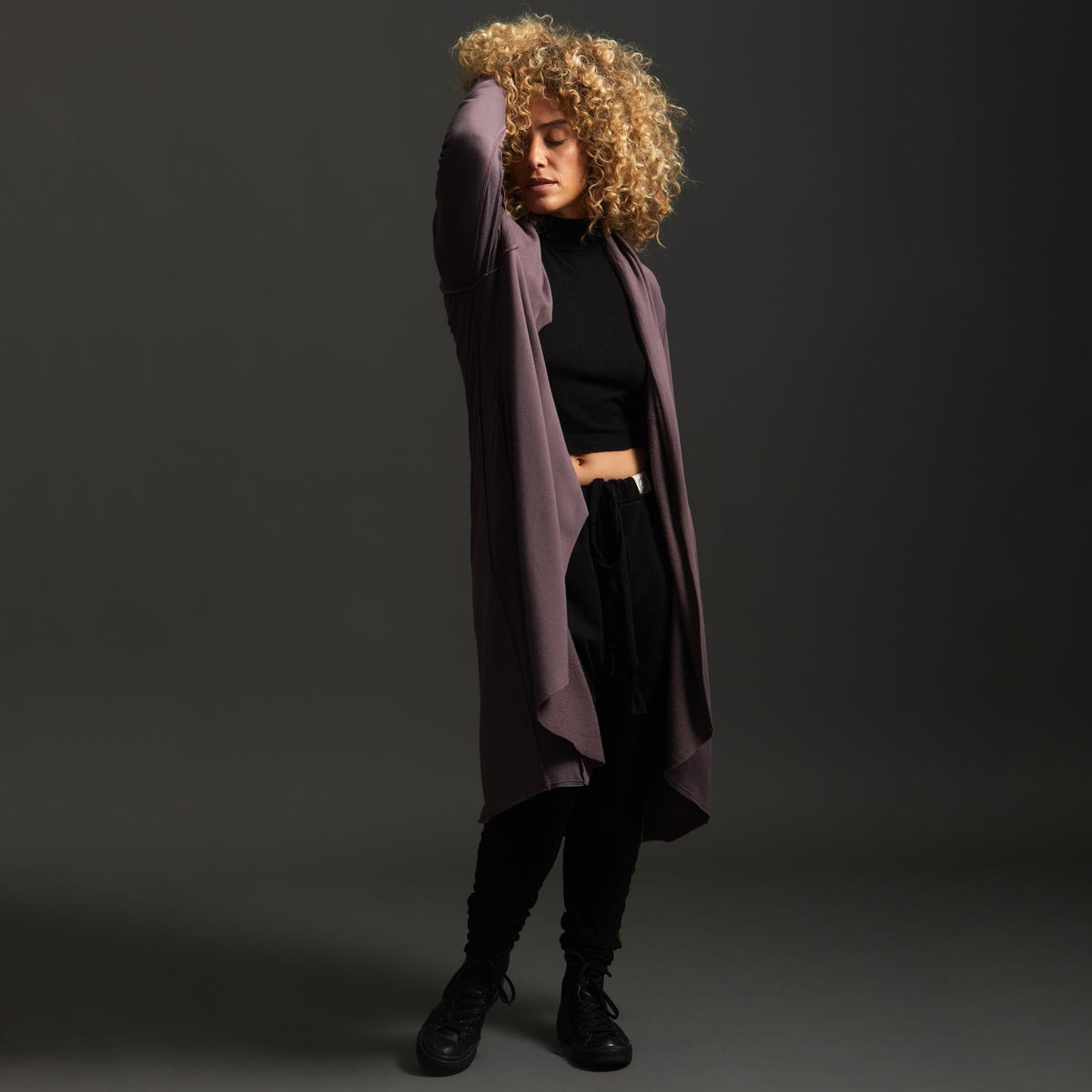 Woman modeling lavender aion duster