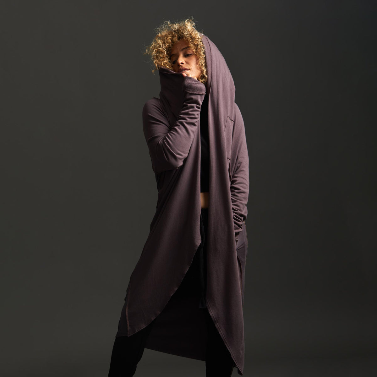 Woman modeling lavender aion duster