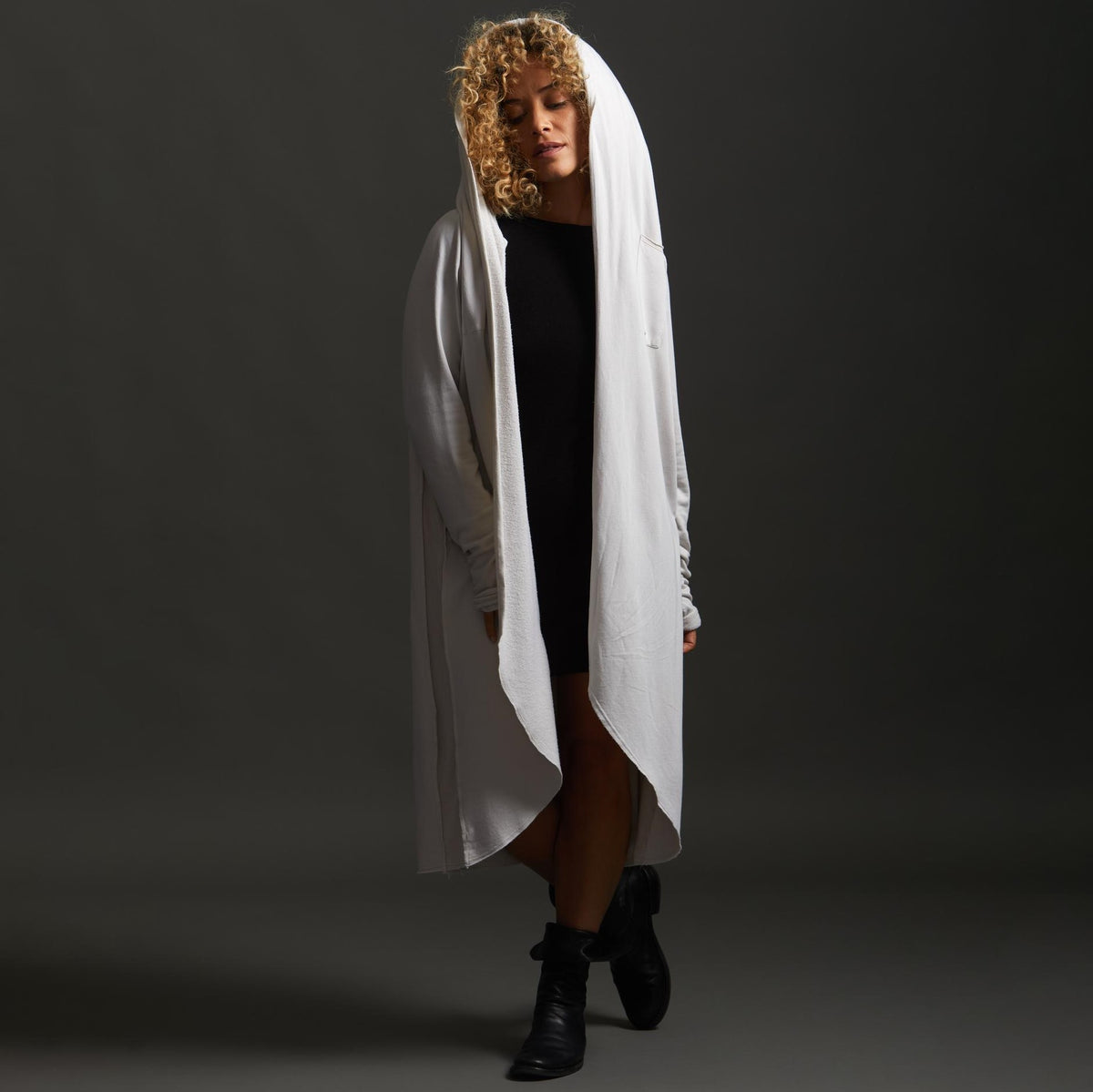 Woman modeling white aion duster
