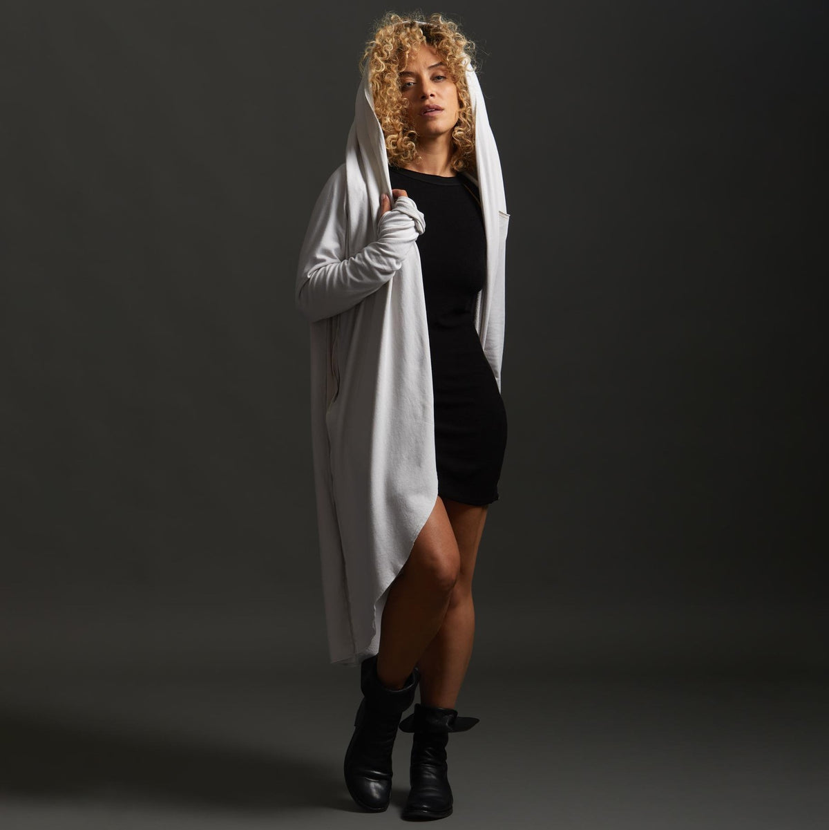 Woman modeling white aion duster