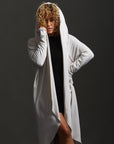 Woman modeling white aion duster