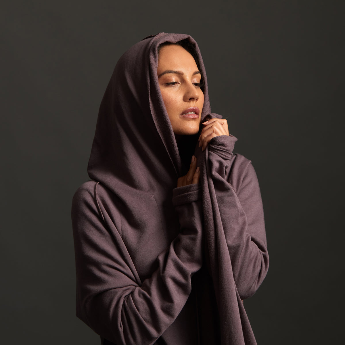 Woman modeling lavender aion duster