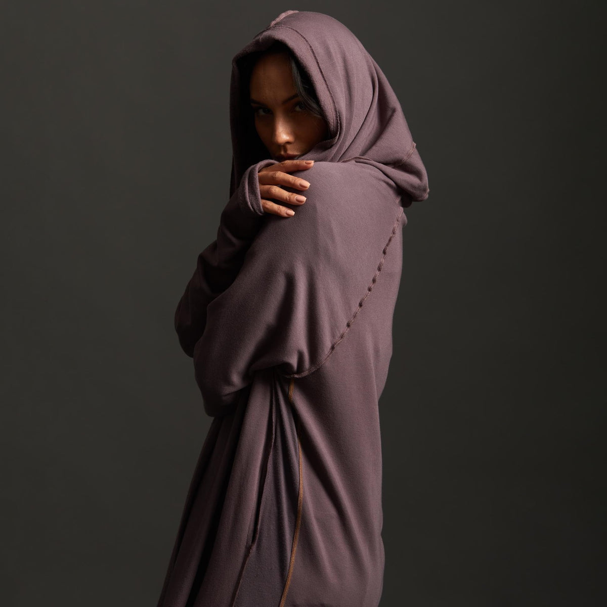 Woman modeling lavender aion duster