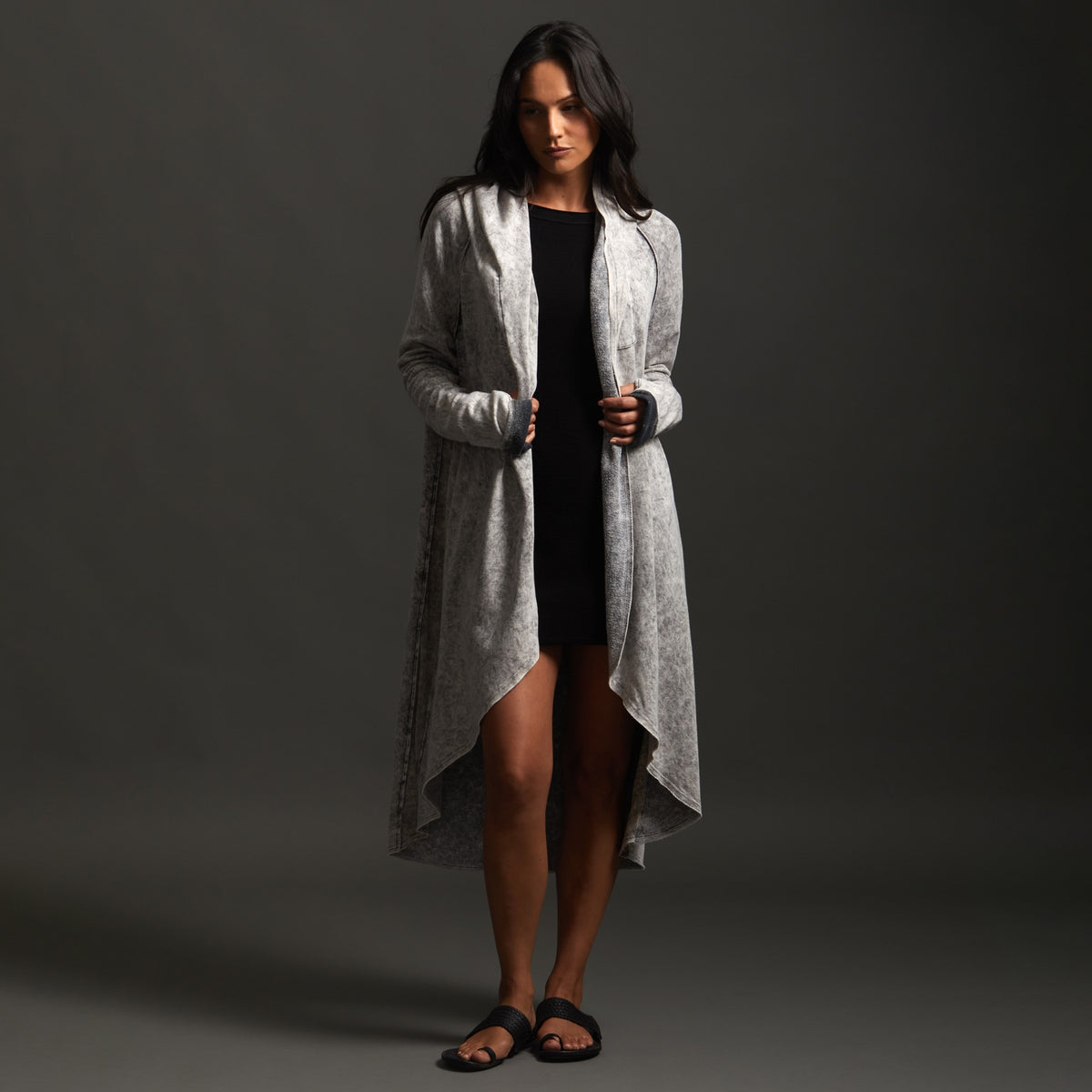 Woman modeling mineral grey aion duster