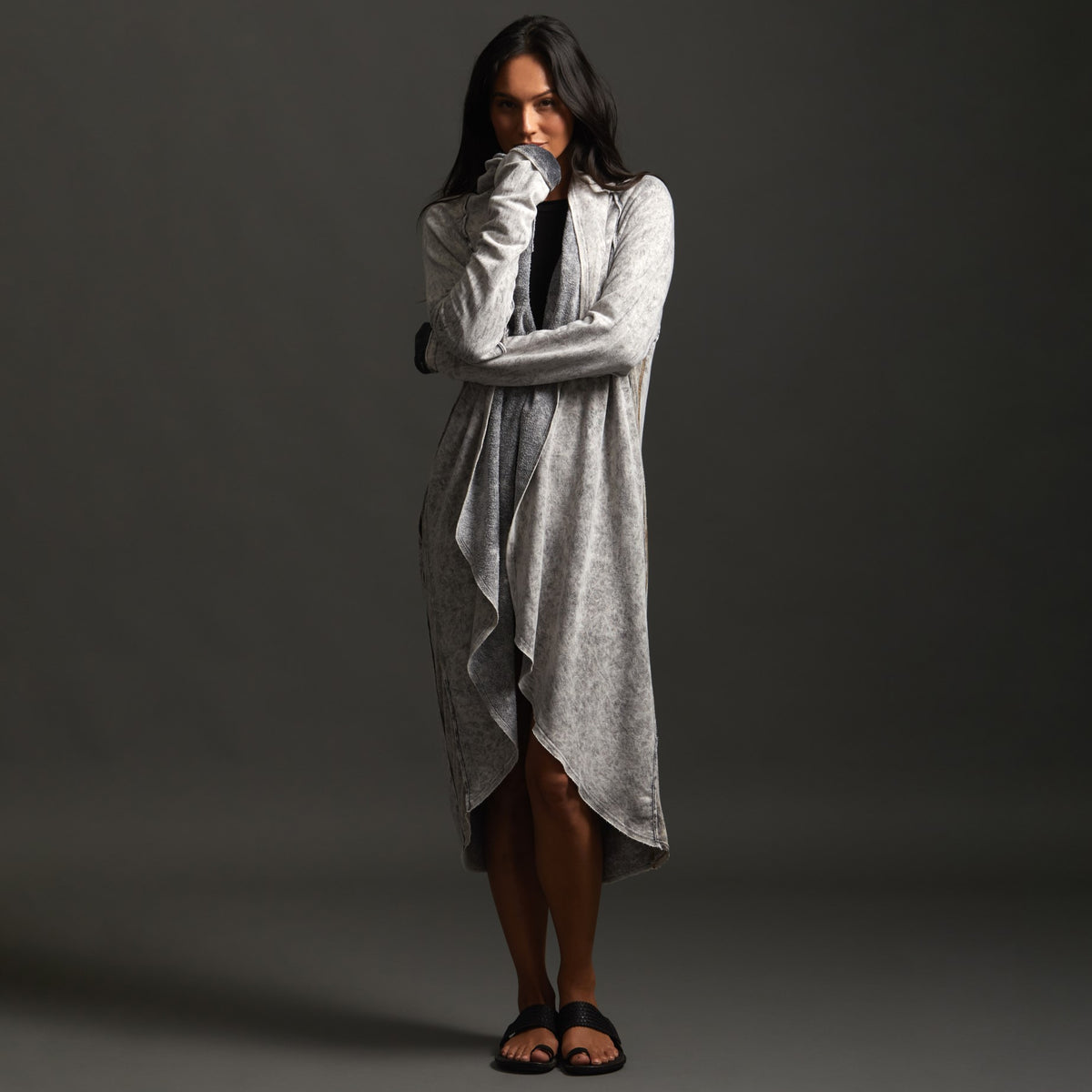 Woman modeling mineral grey aion duster