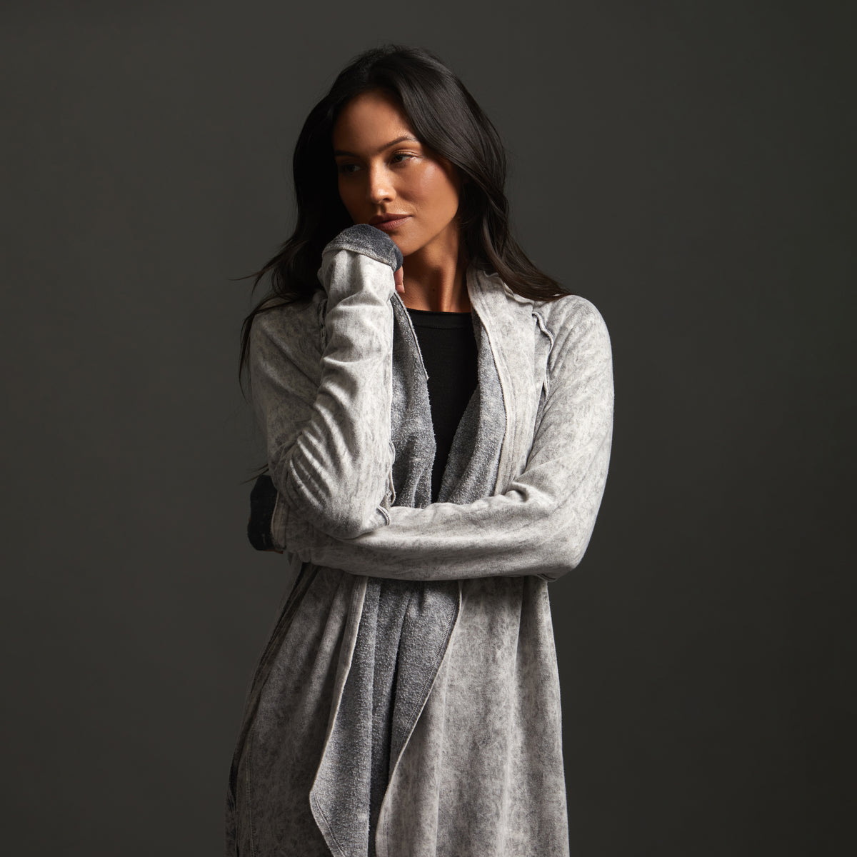 Woman modeling mineral grey aion duster